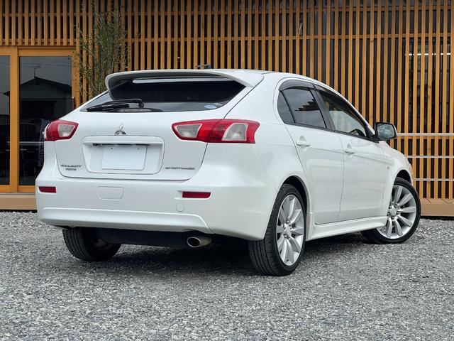 ギャランフォルティススポーツバック スポーツ バックカメラ MTモード パドルシフト 純正18インチアルミホイール キーレス ステアリモコン オートエアコン HIDヘッドライト 純正ナビ スペアキー 取扱説明書 フォグライト CD・DVD再生(10枚目)