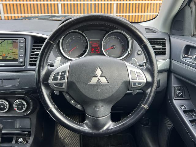 ギャランフォルティススポーツバック スポーツ バックカメラ MTモード パドルシフト 純正18インチアルミホイール キーレス ステアリモコン オートエアコン HIDヘッドライト 純正ナビ スペアキー 取扱説明書 フォグライト CD・DVD再生(17枚目)