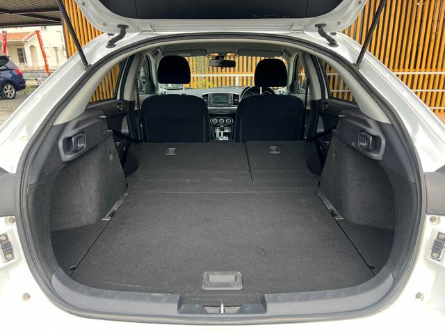 ギャランフォルティススポーツバック スポーツ バックカメラ MTモード パドルシフト 純正18インチアルミホイール キーレス ステアリモコン オートエアコン HIDヘッドライト 純正ナビ スペアキー 取扱説明書 フォグライト CD・DVD再生(25枚目)