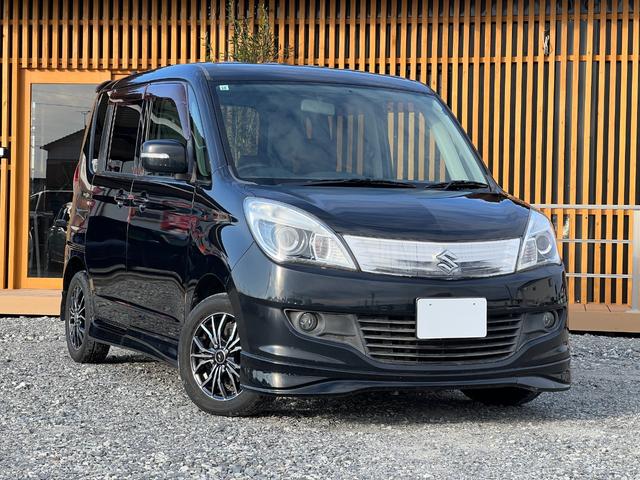 ソリオ Ｓ　Ｂｌｕｅｔｏｏｔｈ　ＥＴＣ　バックカメラ　社外１４インチアルミホイール　両側電動スライドドア　プッシュスタート　スマートキー　オートエアコン　ＨＩＤヘッドライト　フロントフォグ　電動格納ミラー（2枚目）