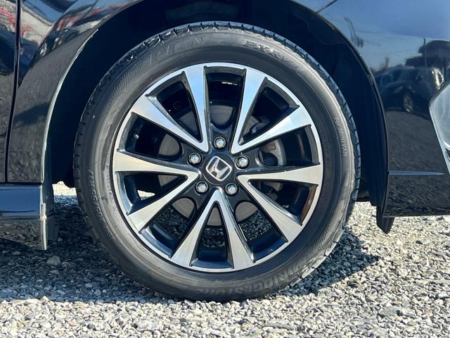 ステップワゴンスパーダ Z クールスピリット ETC バックカメラ クルーズコントロール 純正17インチアルミホイール 両側電動スライドドア スマートキー ハーフレザー オートライト オートエアコン TV HIDヘッドライト フロントフォグ(18枚目)