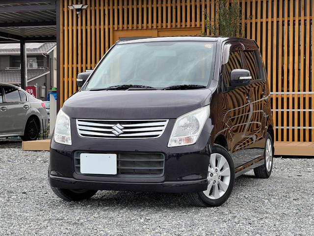 ワゴンＲ ＦＸリミテッド　ＥＴＣ　走行距離３５０００Ｋｍ　純正１４インチアルミホイール　スマートキー　プッシュスタート　オートエアコン　レベライザー５段階　ＣＤ再生　電動格納ドアミラー　ドアバイザー　取扱説明書　スペアキー（6枚目）