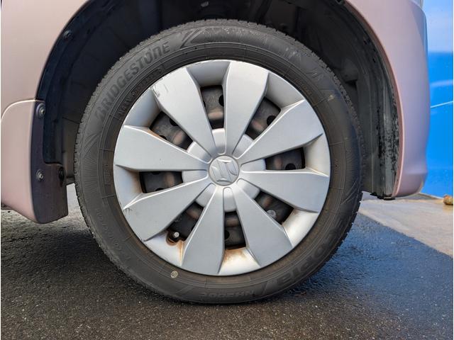 ワゴンR FX 純正CD・オートエアコン・キーレス・アイドリングストップ・ヘッドライトレベライザー・助手席アンダーボックス・分割可動式リアシート・禁煙車(21枚目)