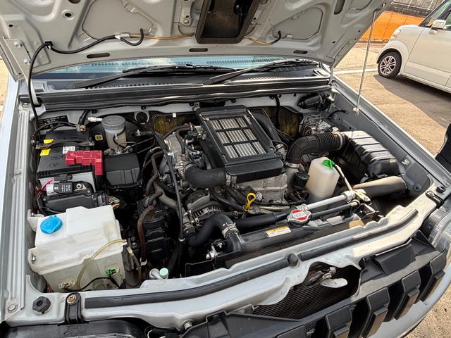 ジムニー ＸＧ　禁煙車　５速マニュアル　社外１６インチアルミ　社外マフラー　社外フロントグリル　ＣＤデッキ　キーレス　ＥＴＣ　マットガード　背面タイヤカバー　ハロゲンヘッドライト　フォグランプ　マニュアルエアコン（18枚目）