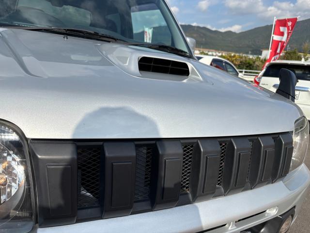 ジムニー ＸＧ　禁煙車　５速マニュアル　社外１６インチアルミ　社外マフラー　社外フロントグリル　ＣＤデッキ　キーレス　ＥＴＣ　マットガード　背面タイヤカバー　ハロゲンヘッドライト　フォグランプ　マニュアルエアコン（20枚目）