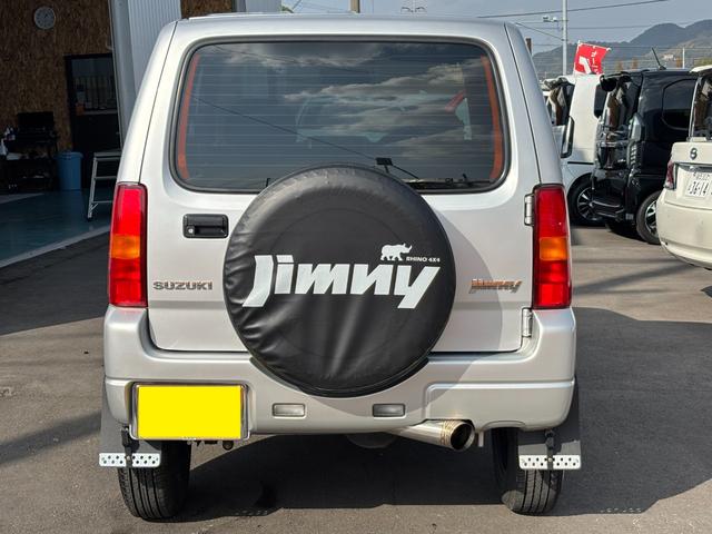 ジムニー ＸＧ　禁煙車　５速マニュアル　社外１６インチアルミ　社外マフラー　社外フロントグリル　ＣＤデッキ　キーレス　ＥＴＣ　マットガード　背面タイヤカバー　ハロゲンヘッドライト　フォグランプ　マニュアルエアコン（25枚目）
