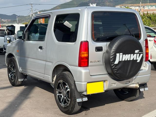 ジムニー ＸＧ　禁煙車　５速マニュアル　社外１６インチアルミ　社外マフラー　社外フロントグリル　ＣＤデッキ　キーレス　ＥＴＣ　マットガード　背面タイヤカバー　ハロゲンヘッドライト　フォグランプ　マニュアルエアコン（26枚目）