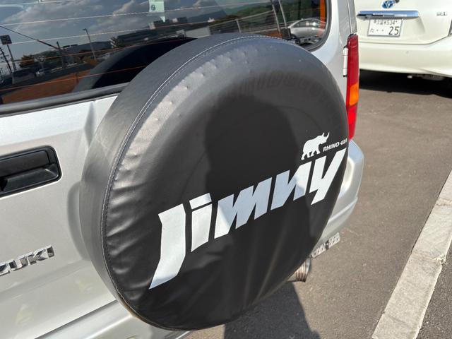 ジムニー ＸＧ　禁煙車　５速マニュアル　社外１６インチアルミ　社外マフラー　社外フロントグリル　ＣＤデッキ　キーレス　ＥＴＣ　マットガード　背面タイヤカバー　ハロゲンヘッドライト　フォグランプ　マニュアルエアコン（29枚目）