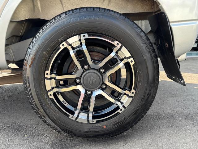 ジムニー ＸＧ　禁煙車　５速マニュアル　社外１６インチアルミ　社外マフラー　社外フロントグリル　ＣＤデッキ　キーレス　ＥＴＣ　マットガード　背面タイヤカバー　ハロゲンヘッドライト　フォグランプ　マニュアルエアコン（30枚目）