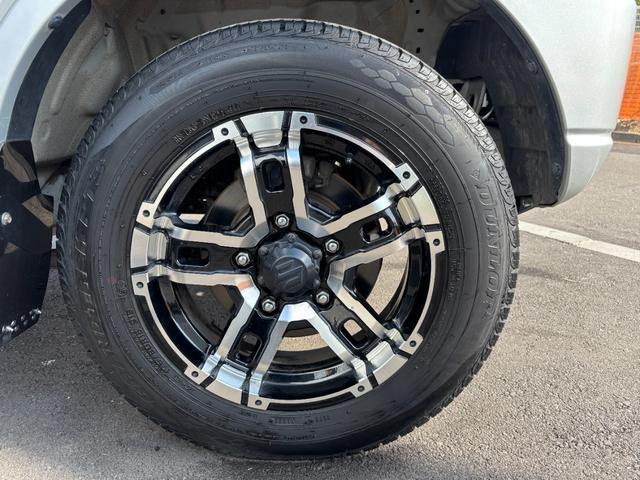 ジムニー ＸＧ　禁煙車　５速マニュアル　社外１６インチアルミ　社外マフラー　社外フロントグリル　ＣＤデッキ　キーレス　ＥＴＣ　マットガード　背面タイヤカバー　ハロゲンヘッドライト　フォグランプ　マニュアルエアコン（31枚目）