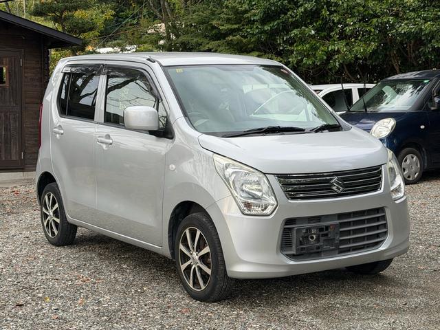 ワゴンR FX 社外14アルミホイール キーレス オートエアコン 電動格納ミラー ベンチシート アイドリングストップ 運転席エアバック 助手席エアバック パワーステアリング パワーウィンドウ 修復歴無し 車検整備付き(7枚目)