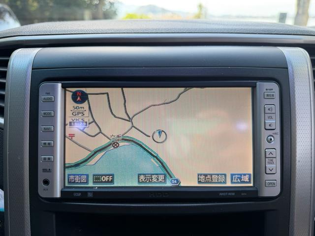 ヴェルファイア ２．４Ｚ　ＨＤＤナビ　バックカメラ　両側パワースライドドア　スマートキー　ＨＩＤヘッドライト　純正アルミ　ローダウン　革調シートカバー　クリアランスソナー　Ｗエアコン　電動格納ミラー　スペアキーあり　車検整備付（4枚目）