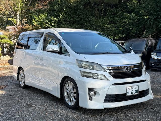 ヴェルファイア ２．４Ｚ　ＨＤＤナビ　バックカメラ　両側パワースライドドア　スマートキー　ＨＩＤヘッドライト　純正アルミ　ローダウン　革調シートカバー　クリアランスソナー　Ｗエアコン　電動格納ミラー　スペアキーあり　車検整備付（10枚目）