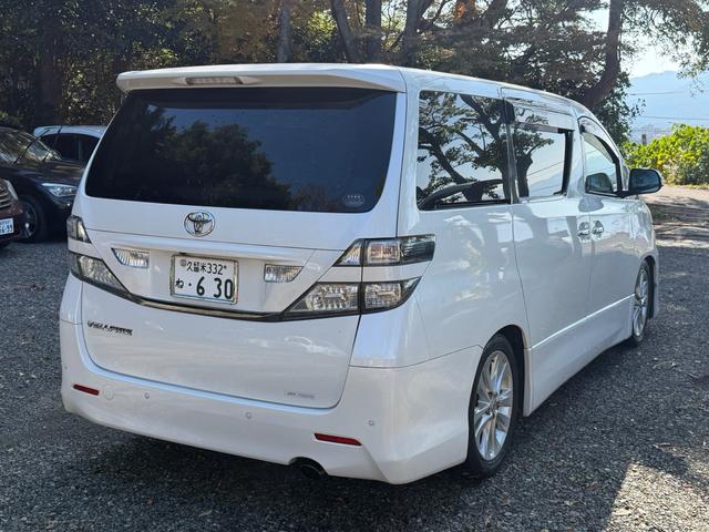 ヴェルファイア ２．４Ｚ　ＨＤＤナビ　バックカメラ　両側パワースライドドア　スマートキー　ＨＩＤヘッドライト　純正アルミ　ローダウン　革調シートカバー　クリアランスソナー　Ｗエアコン　電動格納ミラー　スペアキーあり　車検整備付（13枚目）