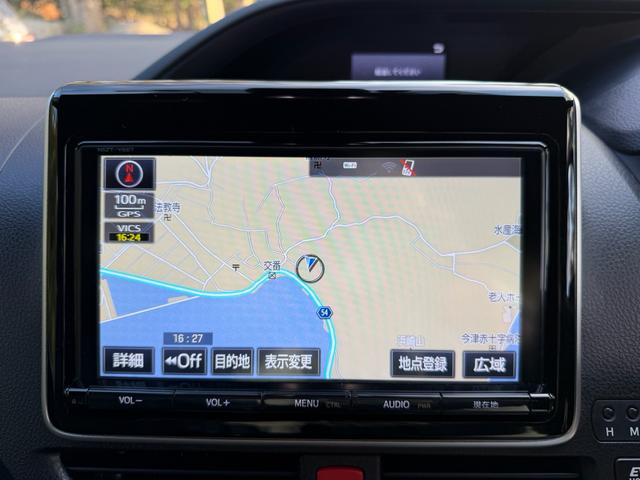 ノア Ｓｉ　ダブルバイビー　メモリーナビ　フルセグテレビ　フリップダウンモニター　両側パワースライドドア　バックカメラ　ＥＴＣ　前席シートヒーター　ＬＥＤヘッドライト　オートエアコン　社外アルミ　革調シートカバー　スマートキー（4枚目）