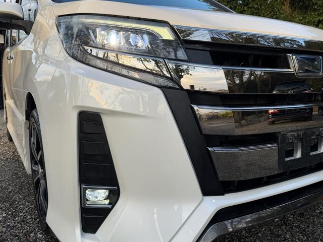 ノア Ｓｉ　ダブルバイビー　メモリーナビ　フルセグテレビ　フリップダウンモニター　両側パワースライドドア　バックカメラ　ＥＴＣ　前席シートヒーター　ＬＥＤヘッドライト　オートエアコン　社外アルミ　革調シートカバー　スマートキー（19枚目）