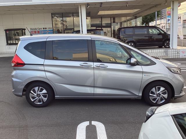 フリードハイブリッド ハイブリッド・Gホンダセンシング 純正9インチナビTV・前後ドライブレコーダー・Bluetooth・バックカメラ・ワンオーナー車(3枚目)