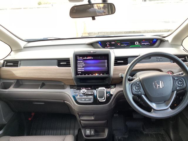 フリードハイブリッド ハイブリッド・Gホンダセンシング 純正9インチナビTV・前後ドライブレコーダー・Bluetooth・バックカメラ・ワンオーナー車(4枚目)