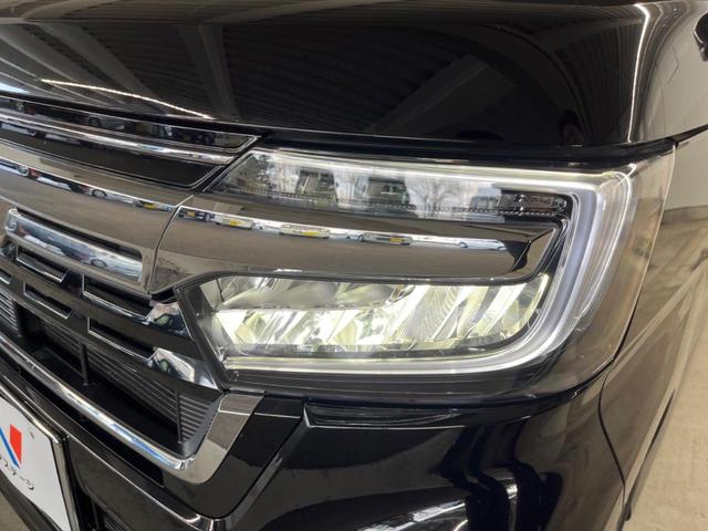 Ｎ－ＢＯＸカスタム Ｌ　両側電動ドア　純正ＳＤナビ　バックカメラ　衝突被害軽減システム　レーダークルーズ　禁煙車　コーナーセンサー　スマートキー　ＬＥＤヘッド　純正１４インチアルミ　オートハイビーム　車線逸脱警報（25枚目）