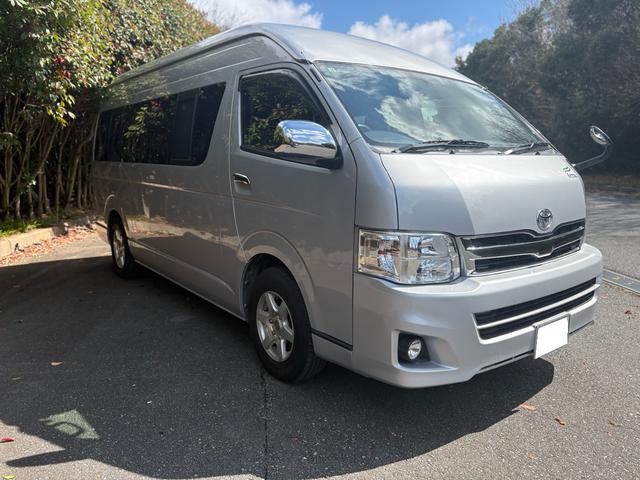 レジアスエースバン スーパーロングワイドDX GLパック ハイルーフ ナッツRVリークキャンピング フルフラットベッド キッチン上部ベッド シンク コンロ アウターシャワー 1000Wインバーター テーブル 換気扇 コンロ バックカメラ 7名乗車 8ナンバー(2枚目)