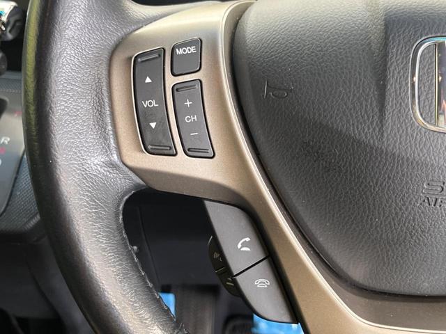 フリードスパイクハイブリッド ジャストセレクション　禁煙車　メーカーナビＴＶ　バックモニター　ＥＴＣ　Ｌパッケージ　両側電動スライドドア　クルーズコントロール　ＨＩＤヘッド／オートライト　純正１５インチＡＷ　スマートキー　オートエアコン（28枚目）