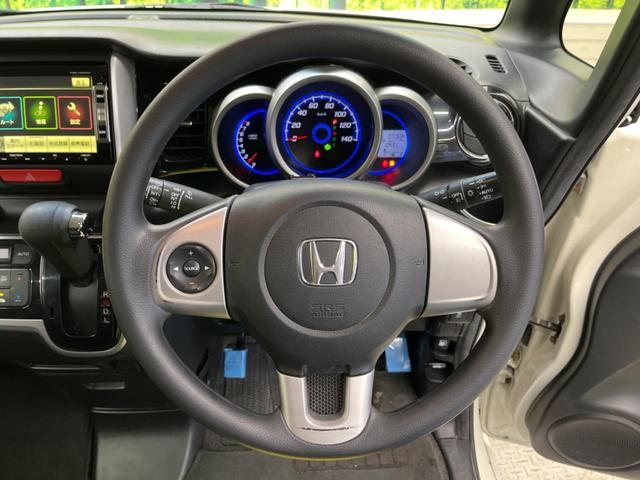 N-BOXカスタム G・Lパッケージ 禁煙車 純正ナビTV バックカメラ 電動スライドドア HIDヘッド 純正14インチAW ETC スマートキー オートエアコン オートライト ステアリングリモコン DVD再生(11枚目)