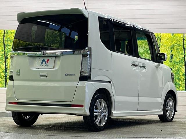 N-BOXカスタム G・Lパッケージ 禁煙車 純正ナビTV バックカメラ 電動スライドドア HIDヘッド 純正14インチAW ETC スマートキー オートエアコン オートライト ステアリングリモコン DVD再生(17枚目)