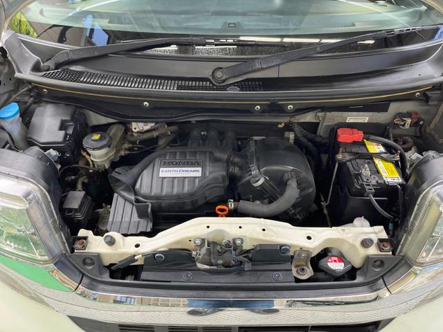 N-BOXカスタム G・Lパッケージ 禁煙車 純正ナビTV バックカメラ 電動スライドドア HIDヘッド 純正14インチAW ETC スマートキー オートエアコン オートライト ステアリングリモコン DVD再生(18枚目)