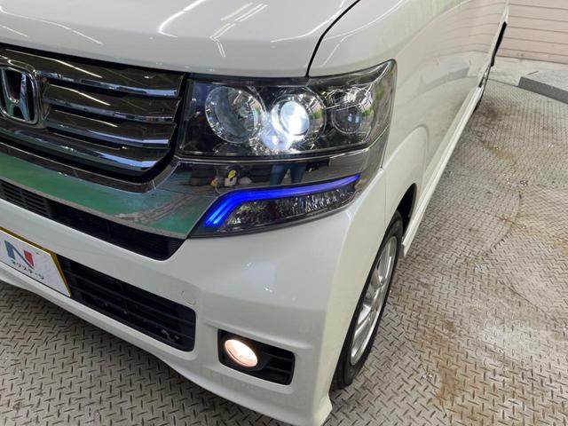 N-BOXカスタム G・Lパッケージ 禁煙車 純正ナビTV バックカメラ 電動スライドドア HIDヘッド 純正14インチAW ETC スマートキー オートエアコン オートライト ステアリングリモコン DVD再生(53枚目)