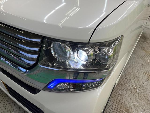 N-BOXカスタム G・Lパッケージ 禁煙車 純正ナビTV バックカメラ 電動スライドドア HIDヘッド 純正14インチAW ETC スマートキー オートエアコン オートライト ステアリングリモコン DVD再生(54枚目)
