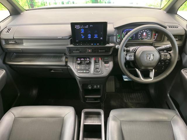 ステップワゴン ｅ：ＨＥＶスパーダ　禁煙車　純正１１．４型ナビＴＶ　マルチビューカメラ　両側電動ドア　ホンダセンシング　渋滞追従アダプティブクルーズ　電動バックドア　半革シート　シートヒーター　後席オートエアコン　後席オットマン（2枚目）