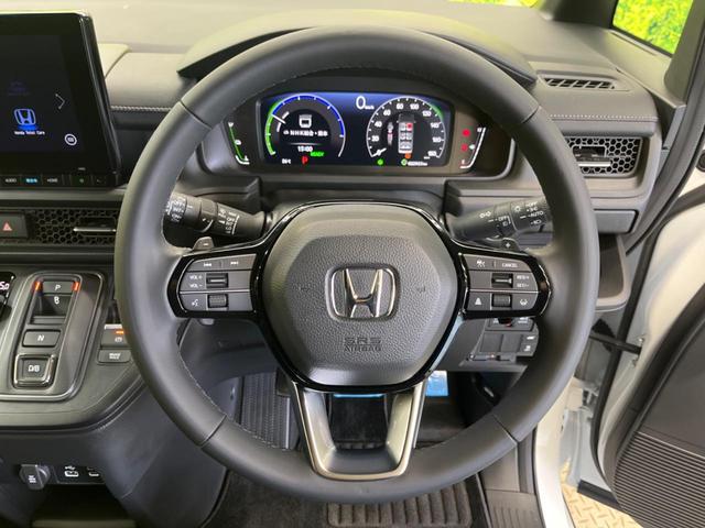 ステップワゴン ｅ：ＨＥＶスパーダ　禁煙車　純正１１．４型ナビＴＶ　マルチビューカメラ　両側電動ドア　ホンダセンシング　渋滞追従アダプティブクルーズ　電動バックドア　半革シート　シートヒーター　後席オートエアコン　後席オットマン（6枚目）