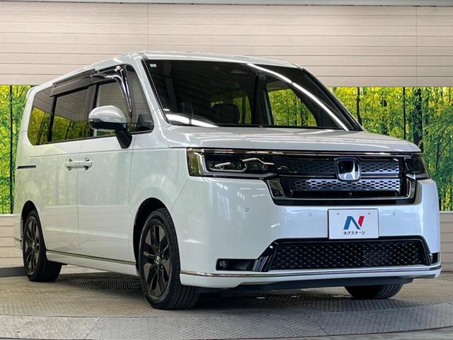 ステップワゴン ｅ：ＨＥＶスパーダ　禁煙車　純正１１．４型ナビＴＶ　マルチビューカメラ　両側電動ドア　ホンダセンシング　渋滞追従アダプティブクルーズ　電動バックドア　半革シート　シートヒーター　後席オートエアコン　後席オットマン（16枚目）
