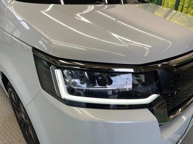 ステップワゴン ｅ：ＨＥＶスパーダ　禁煙車　純正１１．４型ナビＴＶ　マルチビューカメラ　両側電動ドア　ホンダセンシング　渋滞追従アダプティブクルーズ　電動バックドア　半革シート　シートヒーター　後席オートエアコン　後席オットマン（61枚目）