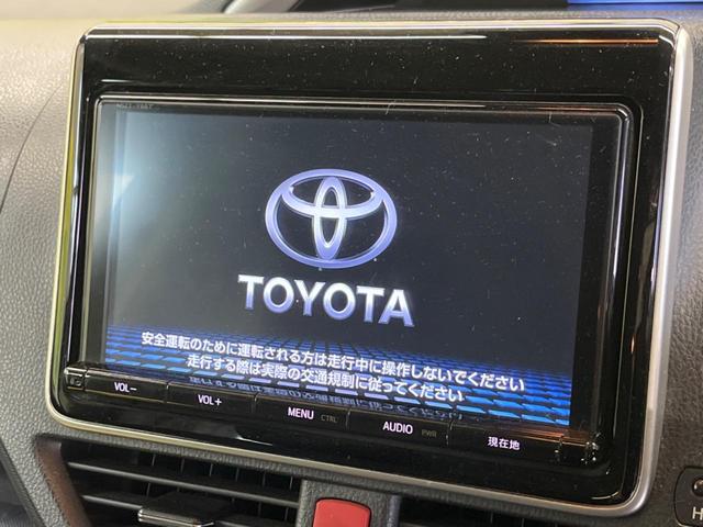 ヴォクシー ハイブリッドＺＳ　煌ＩＩ　禁煙車　純正９型ナビＴＶ　純正１２型後席モニター　両側電動ドア　バックカメラ　セーフティセンス　ＬＥＤヘッド　純正１６インチＡＷ　デュアルオートエアコン　６スピーカー　前後個別再生　ＥＴＣ（3枚目）