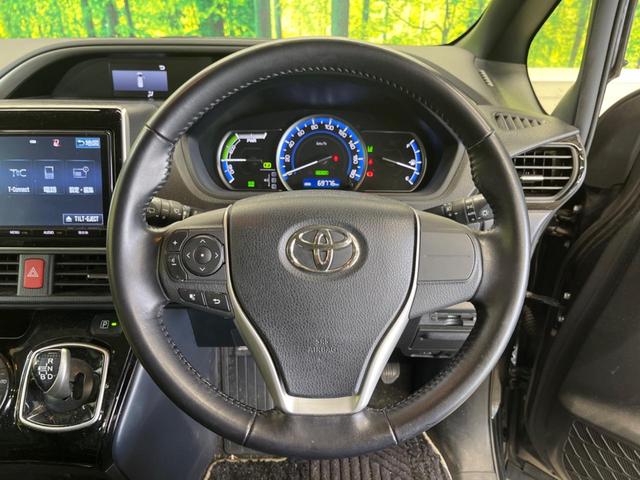 ヴォクシー ハイブリッドＺＳ　煌ＩＩ　禁煙車　純正９型ナビＴＶ　純正１２型後席モニター　両側電動ドア　バックカメラ　セーフティセンス　ＬＥＤヘッド　純正１６インチＡＷ　デュアルオートエアコン　６スピーカー　前後個別再生　ＥＴＣ（7枚目）