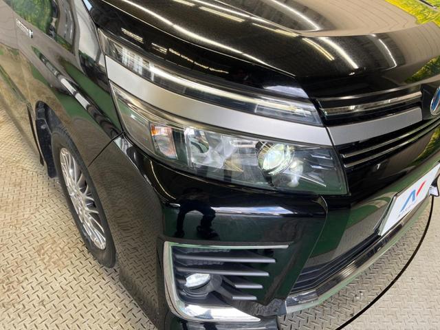 ヴォクシー ハイブリッドＺＳ　煌ＩＩ　禁煙車　純正９型ナビＴＶ　純正１２型後席モニター　両側電動ドア　バックカメラ　セーフティセンス　ＬＥＤヘッド　純正１６インチＡＷ　デュアルオートエアコン　６スピーカー　前後個別再生　ＥＴＣ（12枚目）