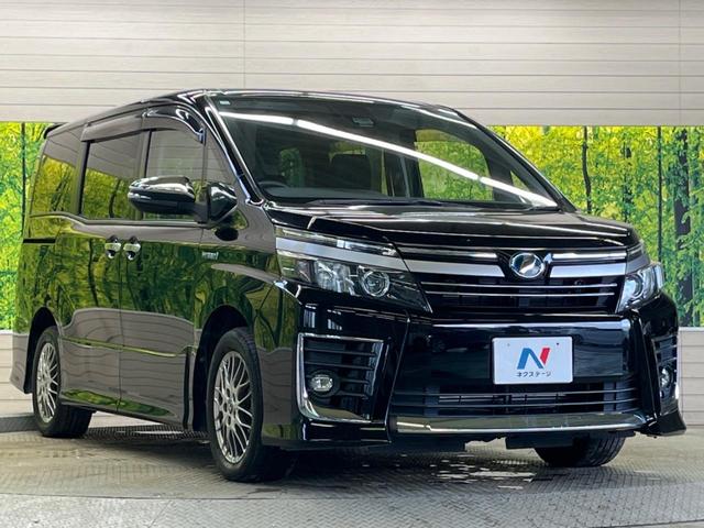 ヴォクシー ハイブリッドＺＳ　煌ＩＩ　禁煙車　純正９型ナビＴＶ　純正１２型後席モニター　両側電動ドア　バックカメラ　セーフティセンス　ＬＥＤヘッド　純正１６インチＡＷ　デュアルオートエアコン　６スピーカー　前後個別再生　ＥＴＣ（16枚目）