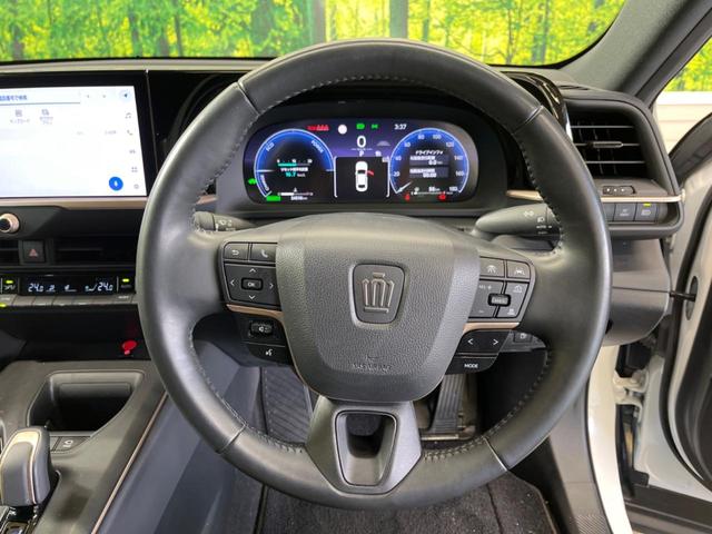 クラウンクロスオーバー Ｇレザーパッケージ　禁煙　純正１２．３型ディスプレイＴＶ　パノラミックビューモニタ　黒革　４眼ＬＥＤ　セーフティセンス　ブラインドスポットモニタ　純正２１インチＡＷ　パワーシート　ポジションメモリ　シートベンチレーション（5枚目）