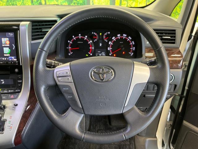 ヴェルファイア ２．４Ｚ　禁煙車　ＢＩＧ－Ｘ８型ナビＴＶ　フリップダウンモニター　電動スライドドア　バックカメラ　ＨＩＤヘッド　純正１８インチＡＷ　クリアランスソナー　前後左右独立オートエアコン　革巻ステアリング　８スピーカー（11枚目）