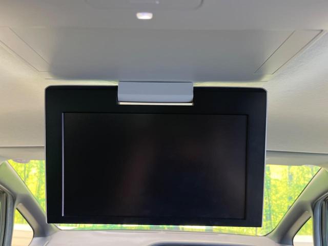 ヴォクシー Ｖ　７人乗　禁煙車　純正９型ナビＴＶ　純正１１型後席モニター　両側電動ドア　バックカメラ　ＬＥＤヘッド　ＢＡＤＸ１７インチＡＷ　クルーズコントロール　ＥＴＣ　スマートキー　デュアルオートエアコン（3枚目）