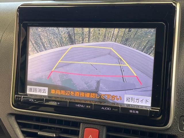 ヴォクシー Ｖ　７人乗　禁煙車　純正９型ナビＴＶ　純正１１型後席モニター　両側電動ドア　バックカメラ　ＬＥＤヘッド　ＢＡＤＸ１７インチＡＷ　クルーズコントロール　ＥＴＣ　スマートキー　デュアルオートエアコン（5枚目）