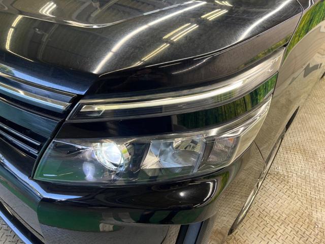 ヴォクシー Ｖ　７人乗　禁煙車　純正９型ナビＴＶ　純正１１型後席モニター　両側電動ドア　バックカメラ　ＬＥＤヘッド　ＢＡＤＸ１７インチＡＷ　クルーズコントロール　ＥＴＣ　スマートキー　デュアルオートエアコン（66枚目）