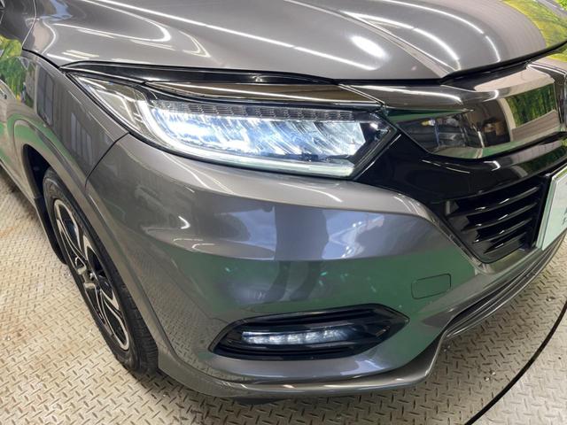 ヴェゼル ハイブリッドＺ・ホンダセンシング　禁煙車　純正８型ナビＴＶ　バックカメラ　アダプティブクルーズ　ＬＥＤヘッド　純正１７インチＡＷ　半革シート　ルーフレール　ＥＴＣ　Ｂｌｕｅｔｏｏｔｈ　シートヒーター　コンフォートビューＰＫＧ（12枚目）