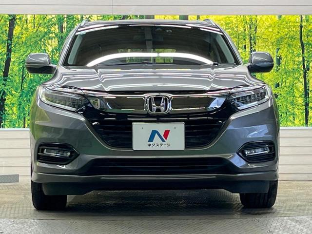 ヴェゼル ハイブリッドＺ・ホンダセンシング　禁煙車　純正８型ナビＴＶ　バックカメラ　アダプティブクルーズ　ＬＥＤヘッド　純正１７インチＡＷ　半革シート　ルーフレール　ＥＴＣ　Ｂｌｕｅｔｏｏｔｈ　シートヒーター　コンフォートビューＰＫＧ（14枚目）
