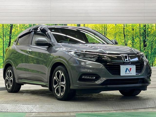 ヴェゼル ハイブリッドＺ・ホンダセンシング　禁煙車　純正８型ナビＴＶ　バックカメラ　アダプティブクルーズ　ＬＥＤヘッド　純正１７インチＡＷ　半革シート　ルーフレール　ＥＴＣ　Ｂｌｕｅｔｏｏｔｈ　シートヒーター　コンフォートビューＰＫＧ（16枚目）