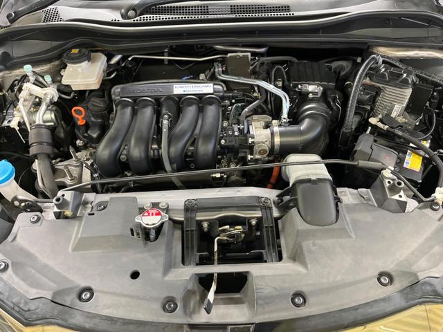 ヴェゼル ハイブリッドＺ・ホンダセンシング　禁煙車　純正８型ナビＴＶ　バックカメラ　アダプティブクルーズ　ＬＥＤヘッド　純正１７インチＡＷ　半革シート　ルーフレール　ＥＴＣ　Ｂｌｕｅｔｏｏｔｈ　シートヒーター　コンフォートビューＰＫＧ（19枚目）