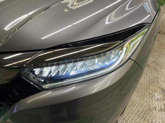 ヴェゼル ハイブリッドＺ・ホンダセンシング　禁煙車　純正８型ナビＴＶ　バックカメラ　アダプティブクルーズ　ＬＥＤヘッド　純正１７インチＡＷ　半革シート　ルーフレール　ＥＴＣ　Ｂｌｕｅｔｏｏｔｈ　シートヒーター　コンフォートビューＰＫＧ（59枚目）