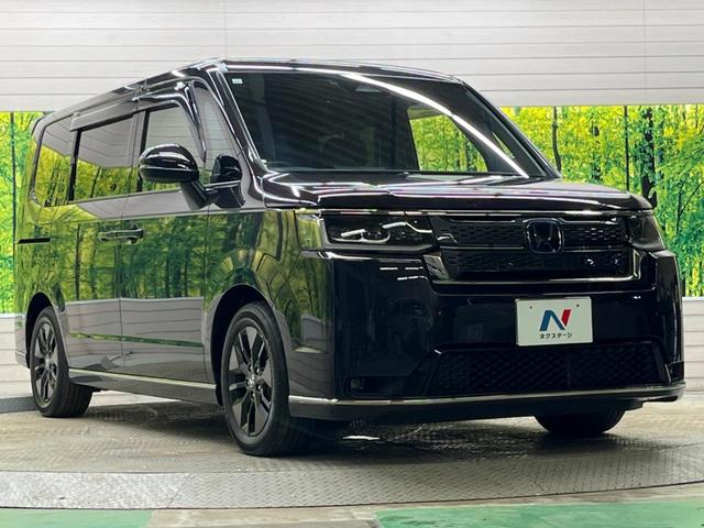 ステップワゴン ｅ：ＨＥＶスパーダ　禁煙車　純正１１．４型ナビＴＶ　純正１５．６型後席モニター　バックカメラ　ホンダセンシング　両側電動ドア　電動バックドア　渋滞追従アダプティブクルーズ　半革　シートヒーター　後席オートエアコン（17枚目）