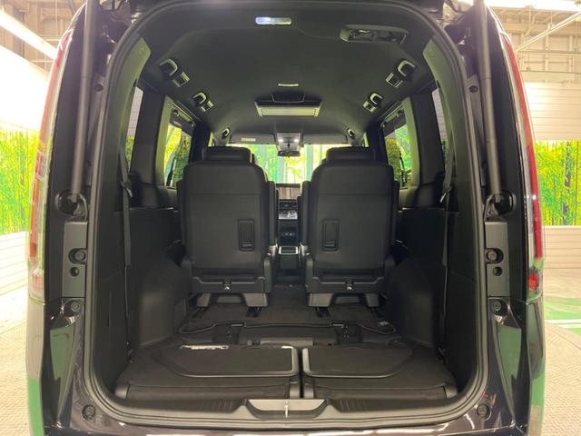ステップワゴン ｅ：ＨＥＶスパーダ　禁煙車　純正１１．４型ナビＴＶ　純正１５．６型後席モニター　バックカメラ　ホンダセンシング　両側電動ドア　電動バックドア　渋滞追従アダプティブクルーズ　半革　シートヒーター　後席オートエアコン（47枚目）